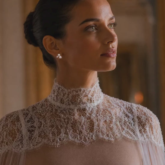 Bride wearing LYS gold pearl cluster earrings