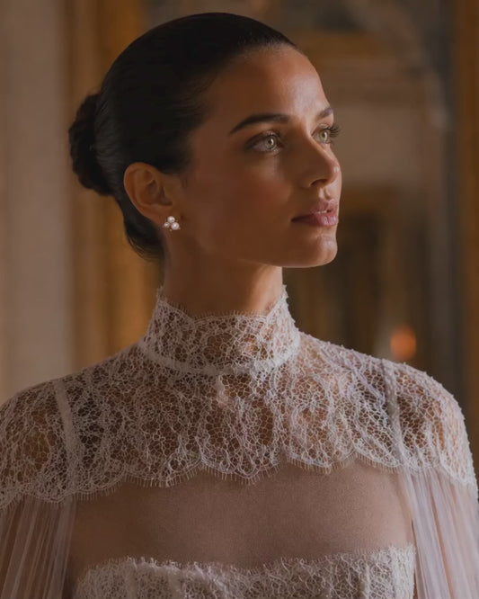 Bride wearing LYS gold pearl cluster earrings