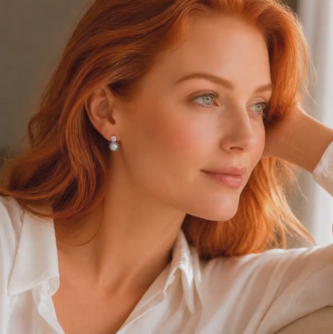 Model wearing Estelle silver grey pearl stud earrings
