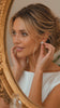LYS Pearl Stud Earrings in sterling silver shown worn