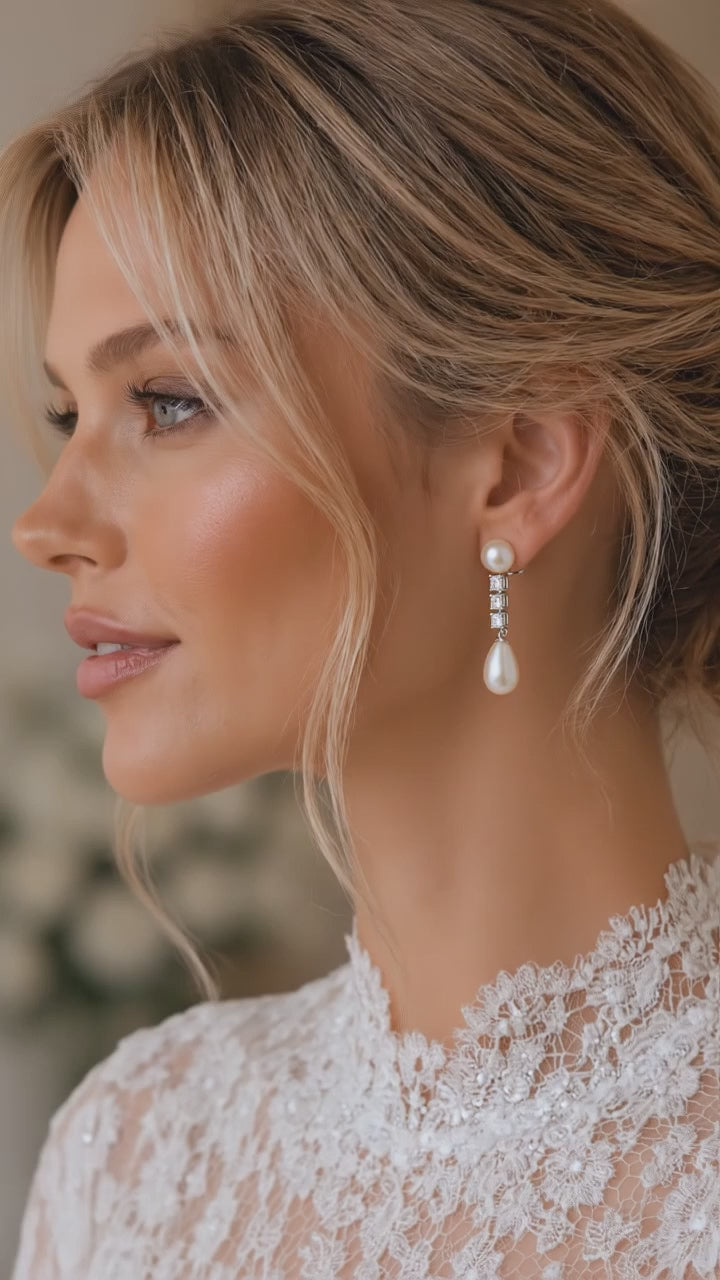 Lunaire pearl drop earrings shown worn, bridal styling