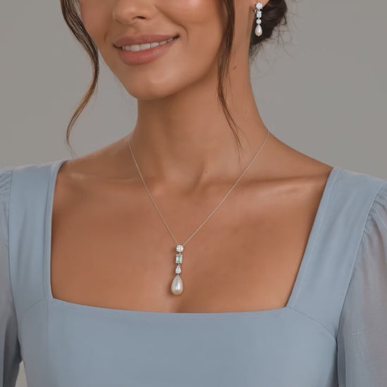 Éclair Earrings shown worn with the matching pendant