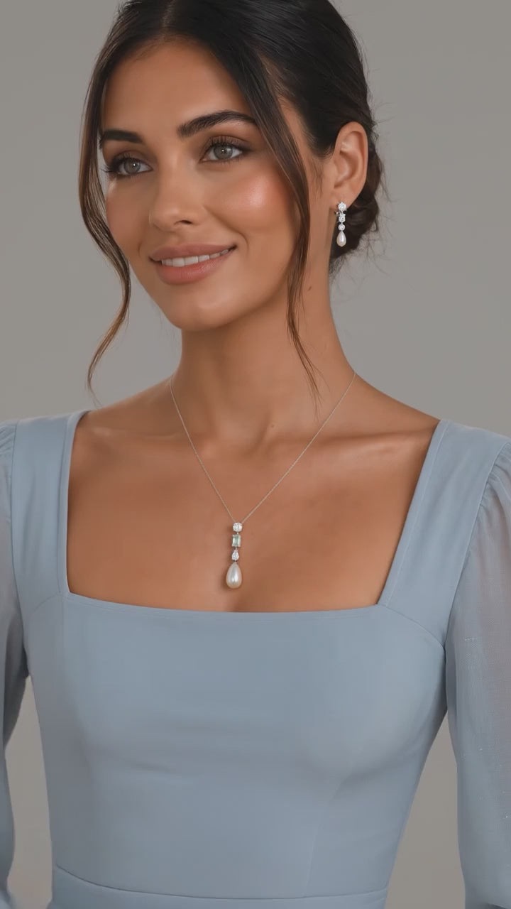 Éclair Earrings shown worn with the matching pendant