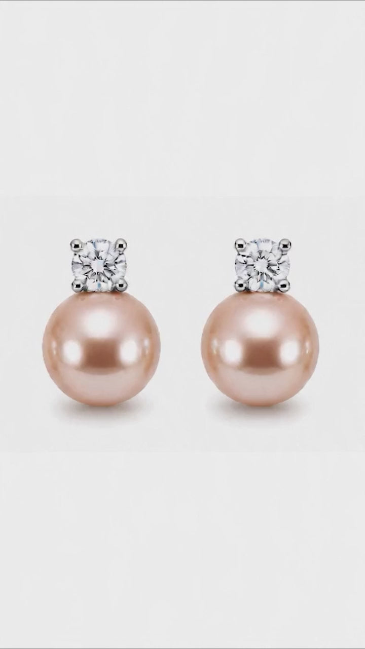 Model wearing Estelle champagne pink pearl stud earrings